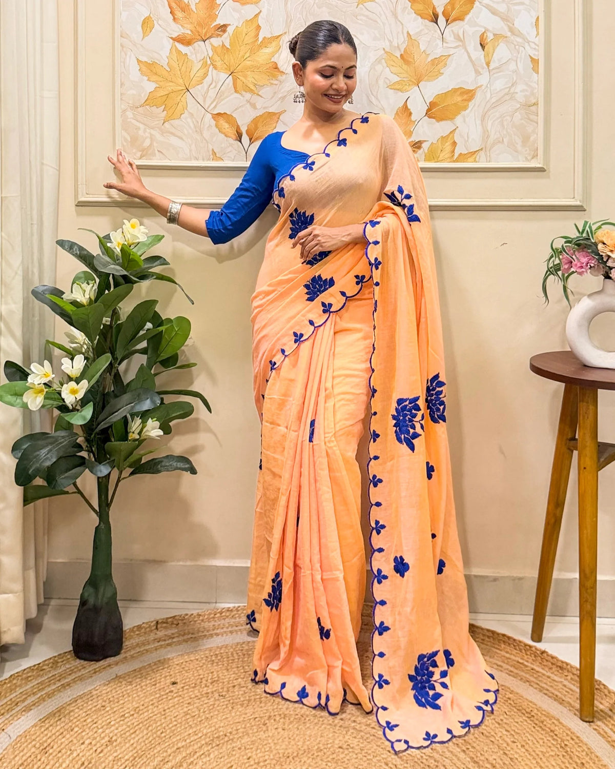 Aame - Amber Azure (Peach Hand Embroidered Mulmul Saree)