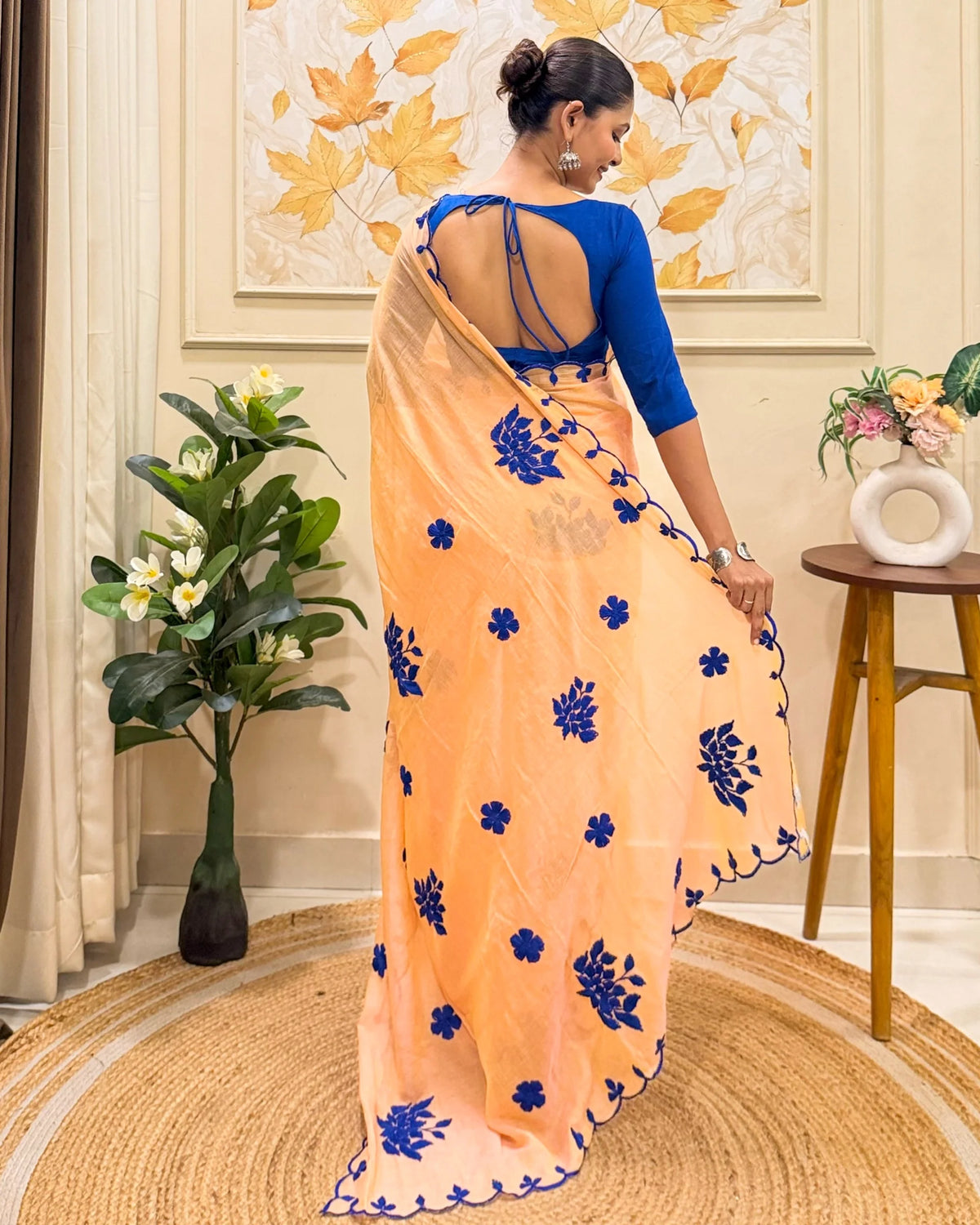 Aame - Amber Azure (Peach Hand Embroidered Mulmul Saree)